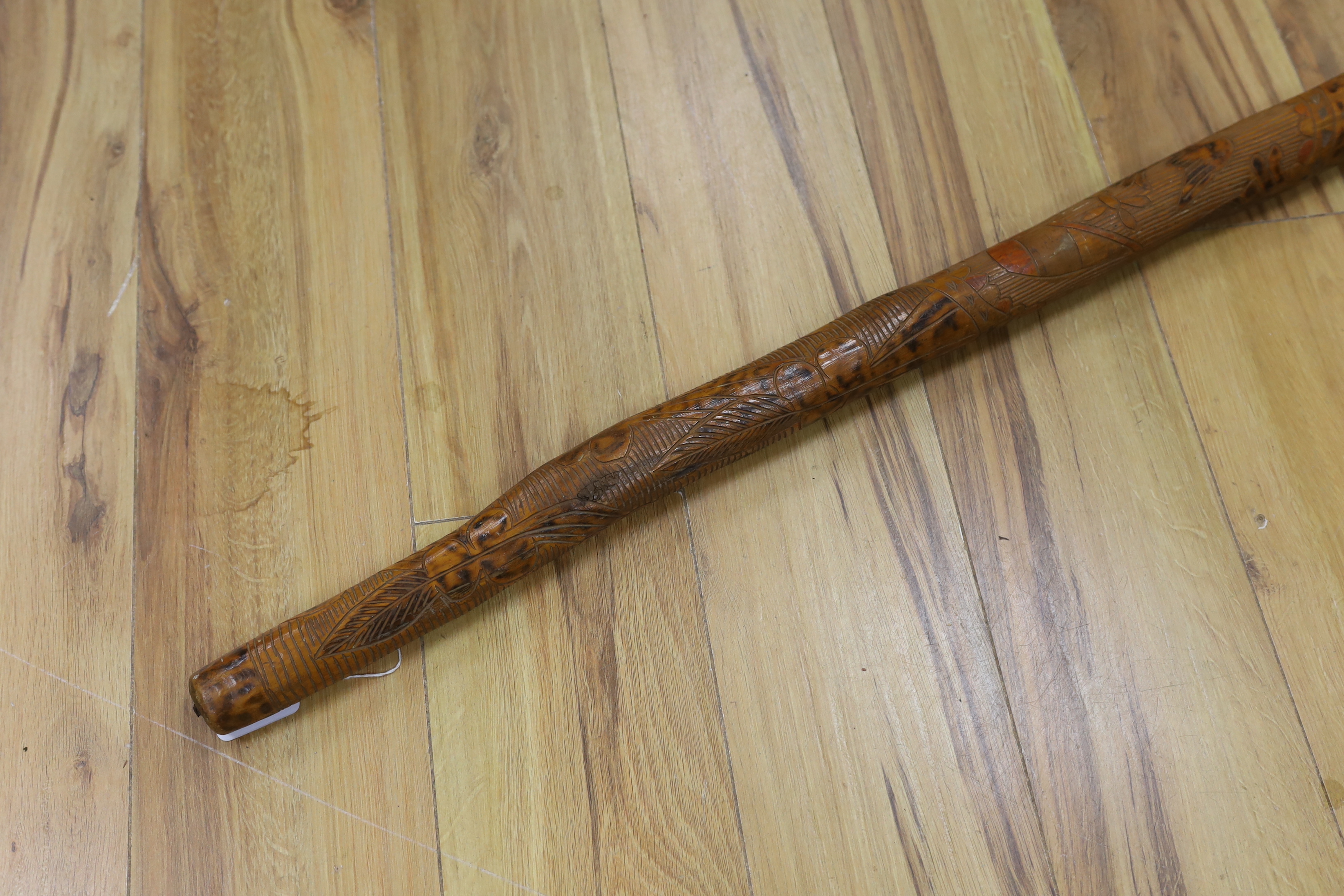 A late 19th/early 20th century Irish carved club, 91.5cm long